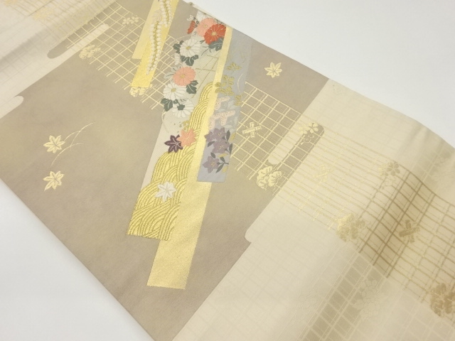 格子に斜線・波・花々模様織出し名古屋帯